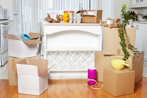 Experienced movers loading furniture onto a truck
