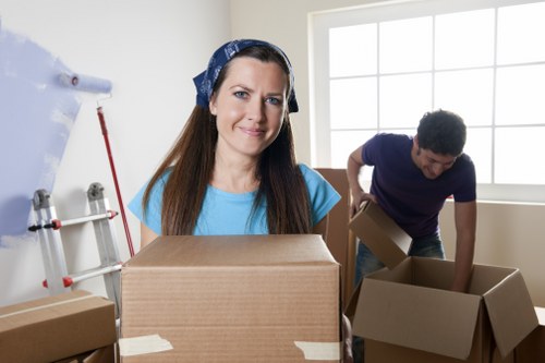 Moving company staff handling fragile items