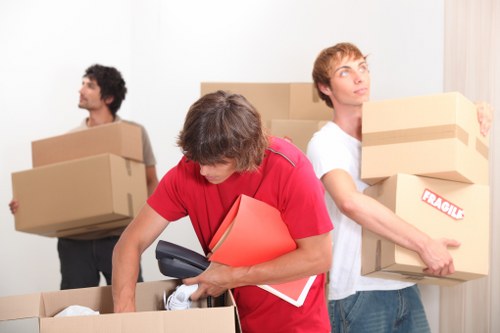 Friendly moving team assisting customers