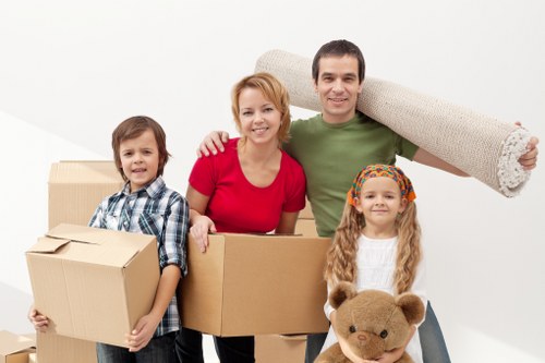 Movers carefully loading furniture